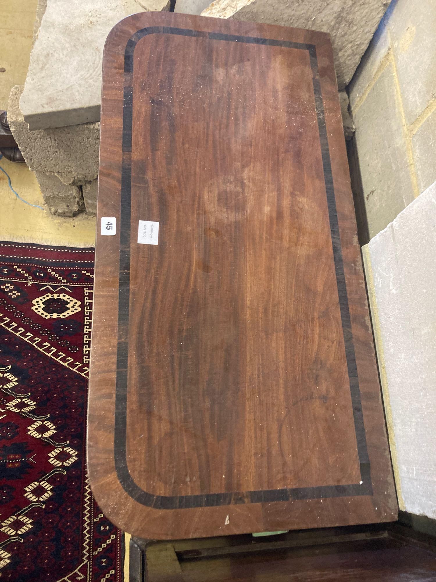 A Regency banded mahogany folding top card table, width 91cm